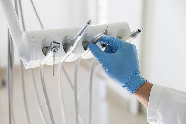 Professional Tooth Extraction technician working in Freeland, WA